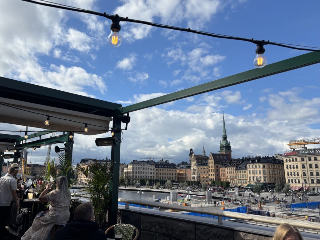 image shows outdoor seating at Brasserie Astrid at Slussen