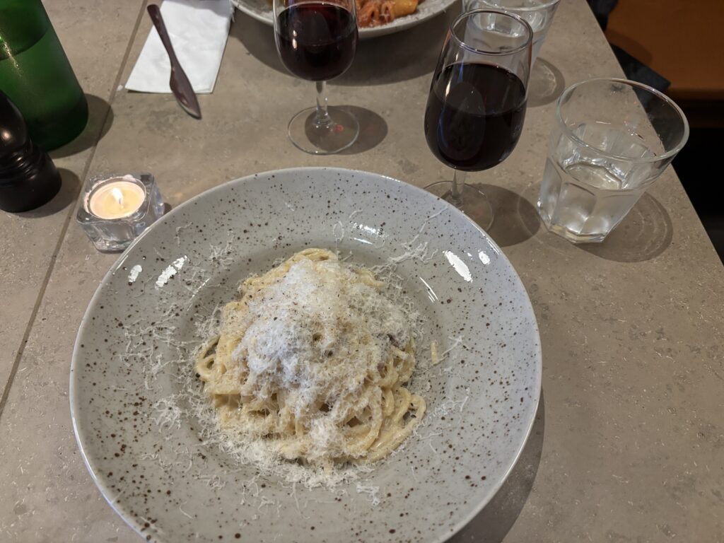 image shows a plate of pasta carbonara at Cucina Povera in Stockholm